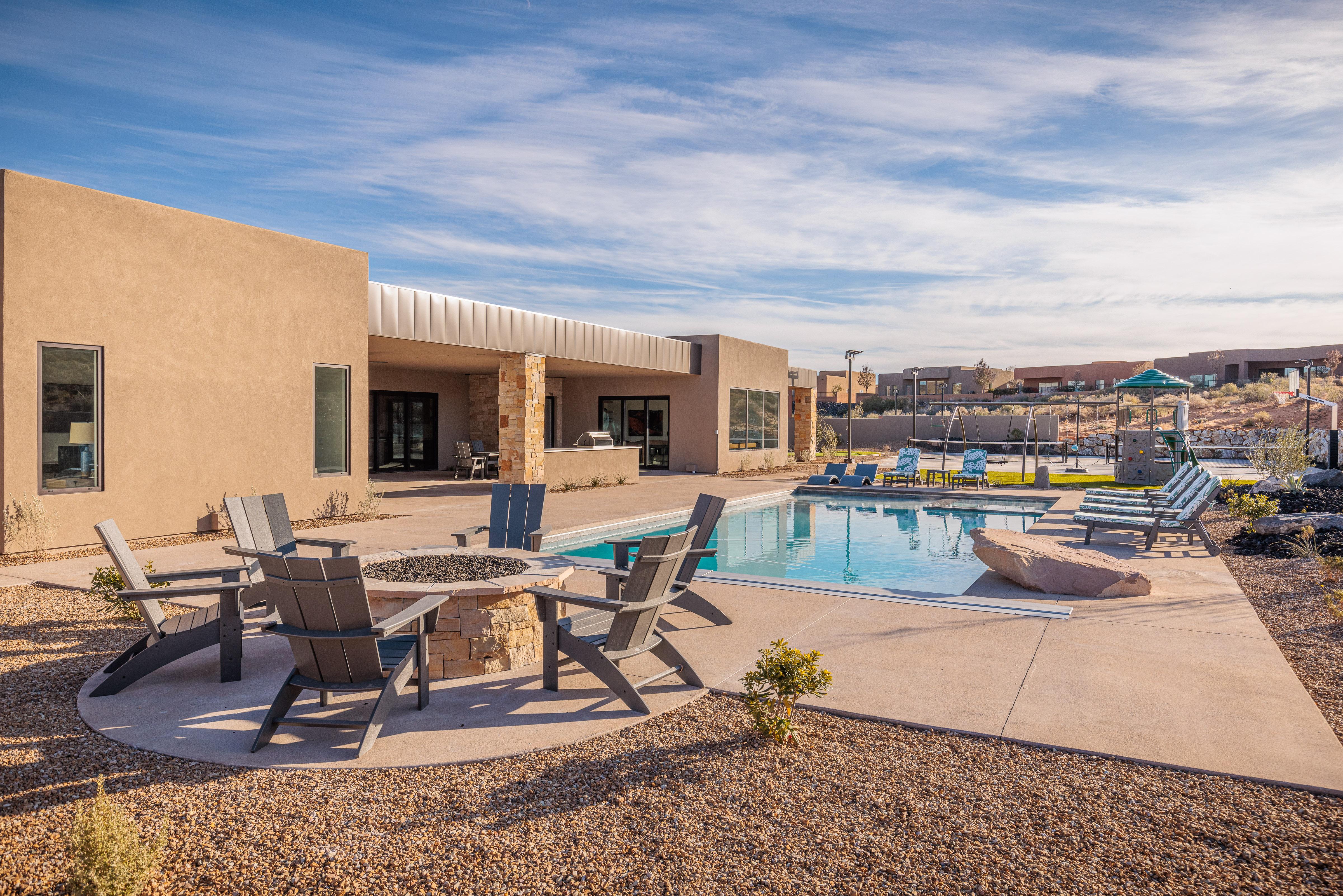 Relax and sit around the outdoor firepit after a day of swimming.