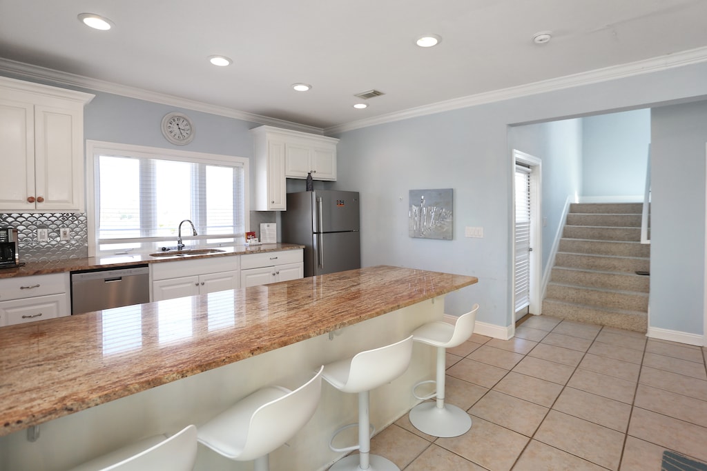 Kitchen Bar & Access to the Top Floor