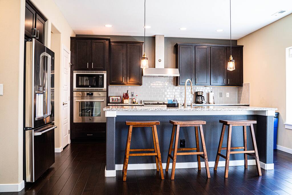 Modern kitchen with sleek countertops, ample cabinetry, and stainless steel appliances—designed for both everyday cooking and effortless entertaining. Modern kitchen with sleek countertops, ample cabinetry, and stainless steel appliances—designed for both everyday cooking and effortless entertaining.