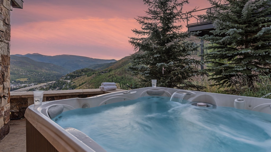 Soak in the private hot tub on the lower level