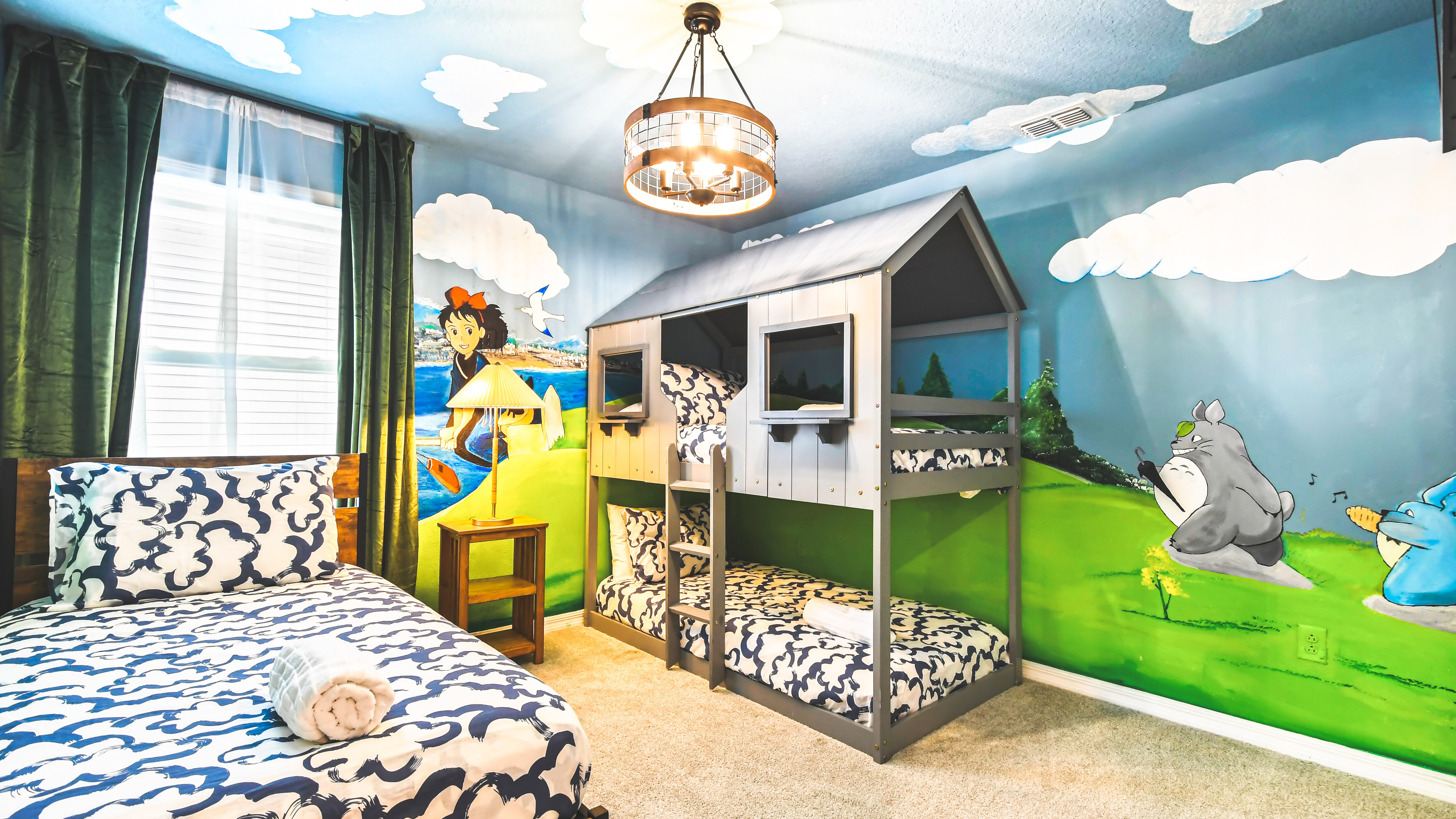Charming children's room with twin and bunk beds, creating a playful sleepover-friendly space