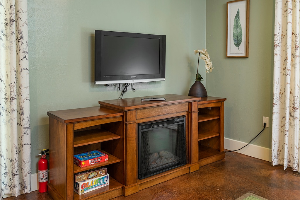 Entertainment station and electric fireplace downstairs.