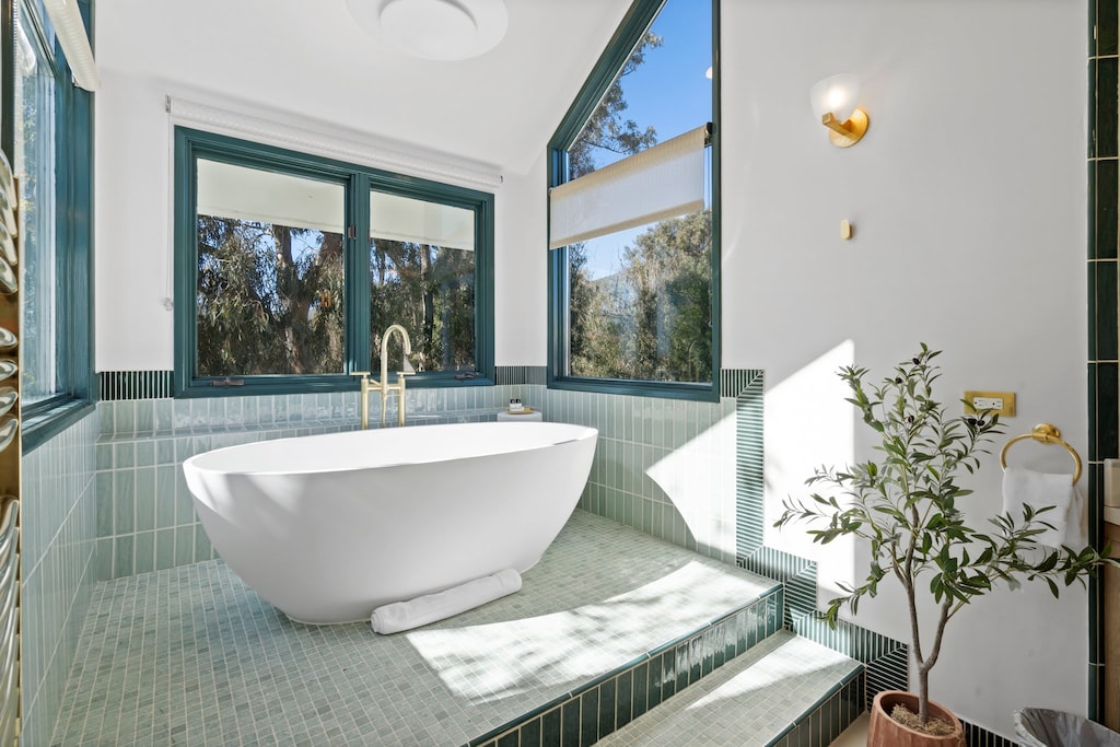 Step into serenity—natural light and elegant finishes set the scene.