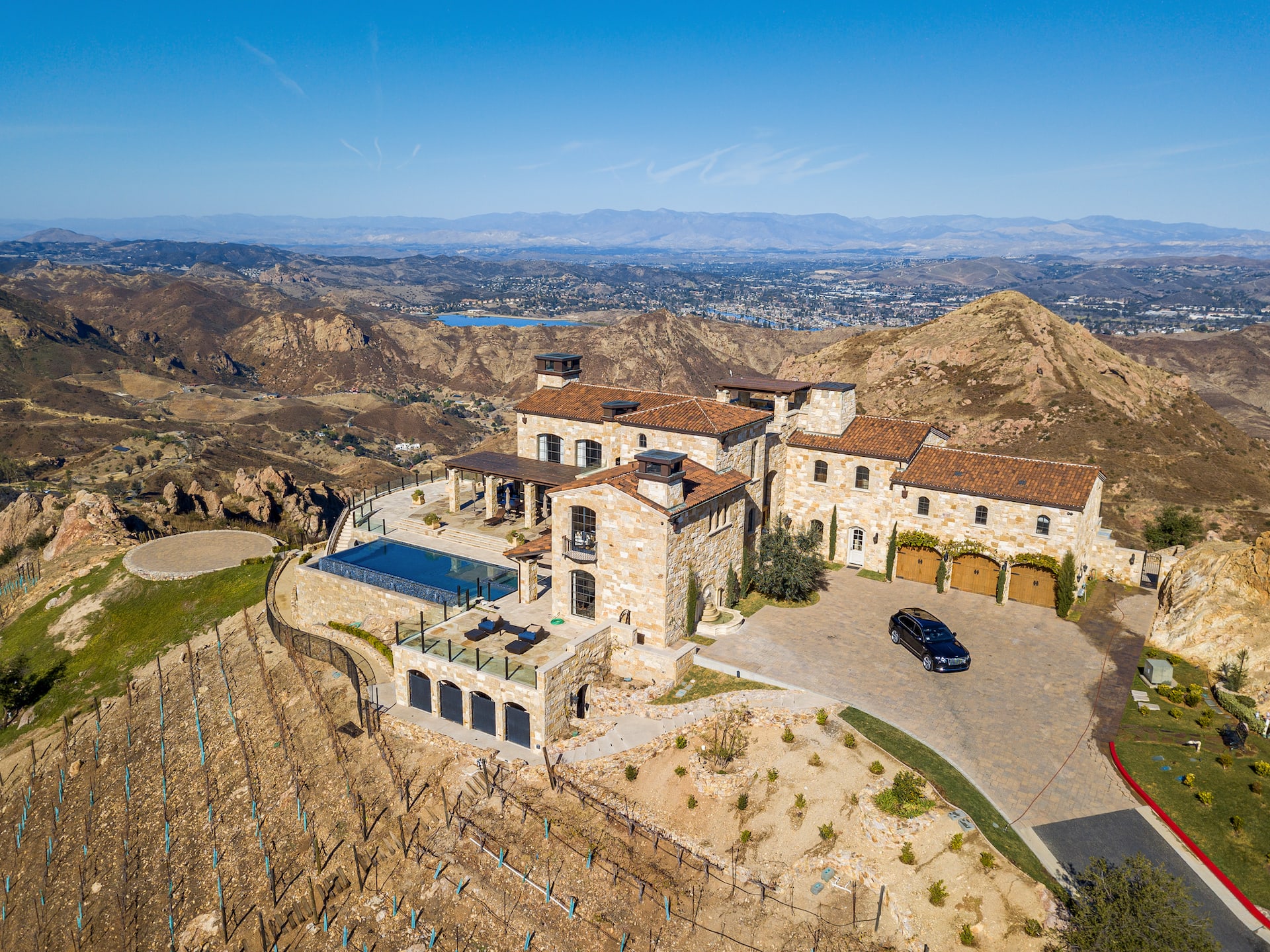 This estate is nestled on the top of the scenic Santa Monica Mountains surrounded by lush vineyards and gardens.