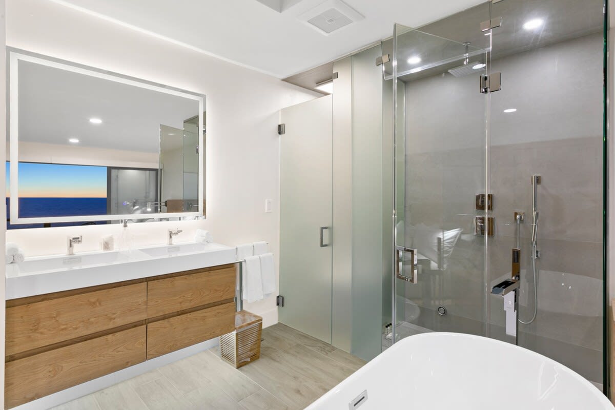 Full bath with glass walk in rain shower