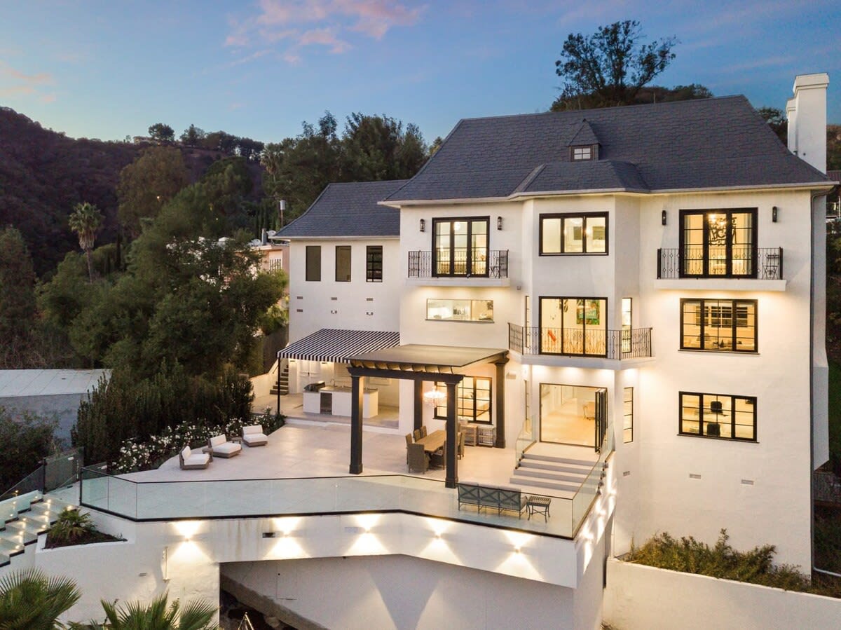 This 5 bedroom home is divine as the sun sets in Beverly Hills.