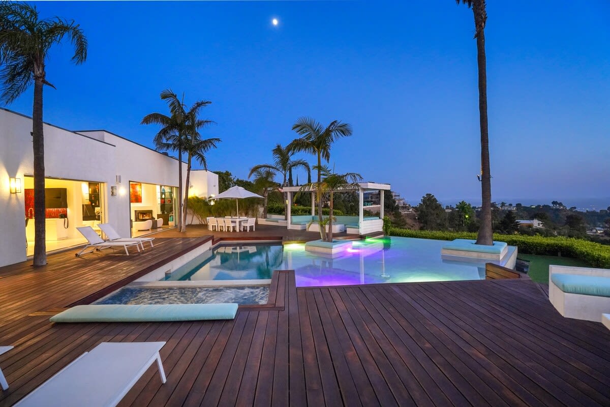 Experience Pool Serenity Under the Night Sky, where the peaceful ambiance invites relaxation and contemplation. Experience Pool Serenity Under the Night Sky, where the peaceful ambiance invites relaxation and contemplation.