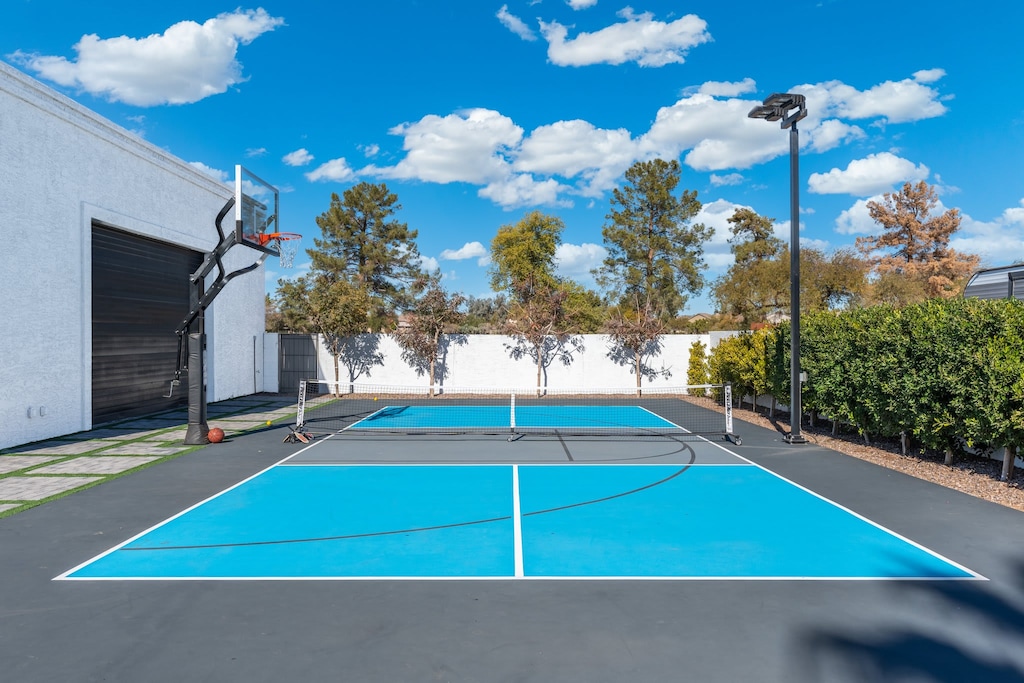 Pickleball anyone? Regulation pickleball court and half basketball with light