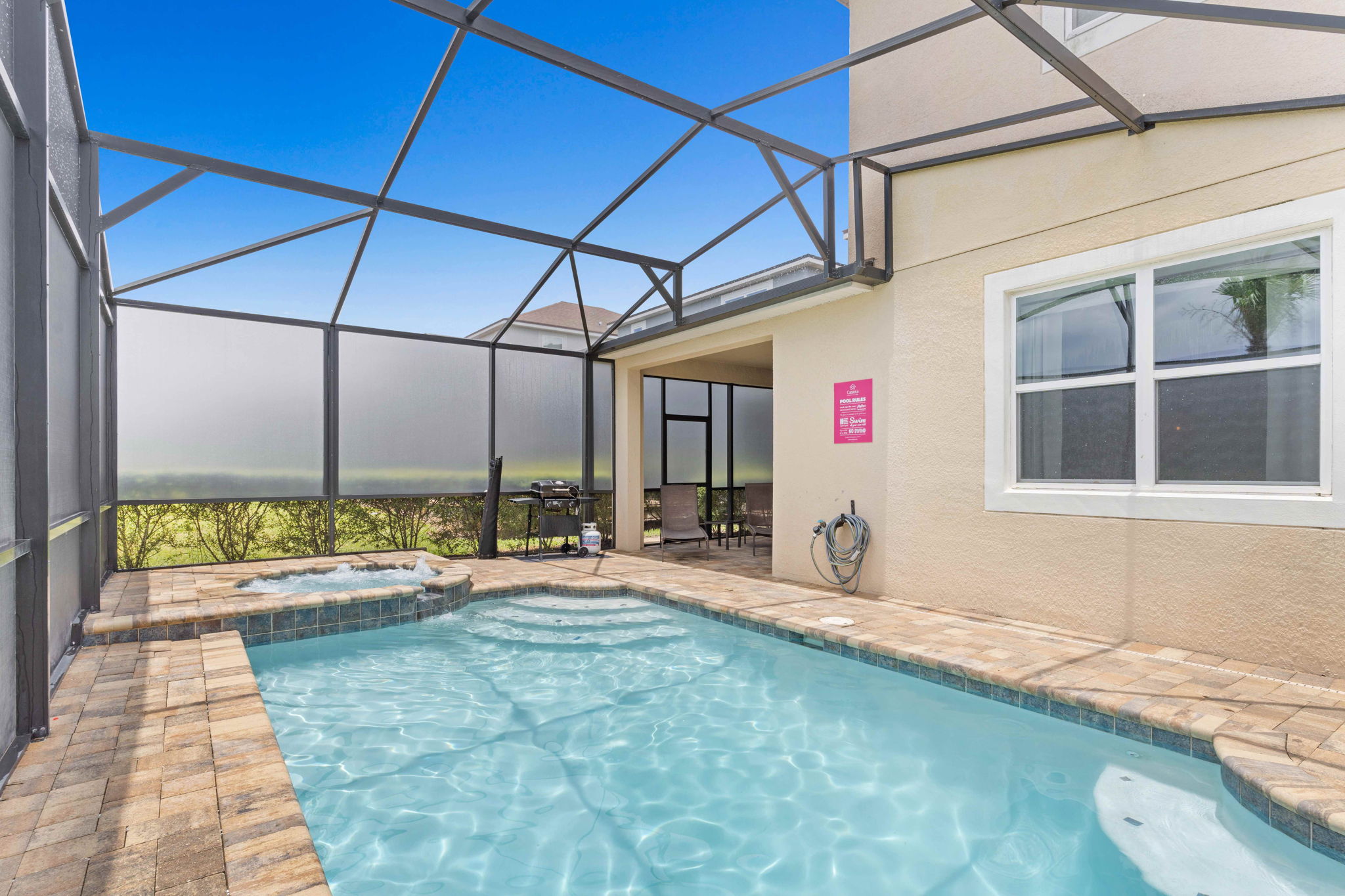Resplendent private pool area of the home in Kissimmee Florida - Provides a relaxed atmosphere for unwinding  - Space for swimming, games, and activities - Inviting pool area for a perfect getaway