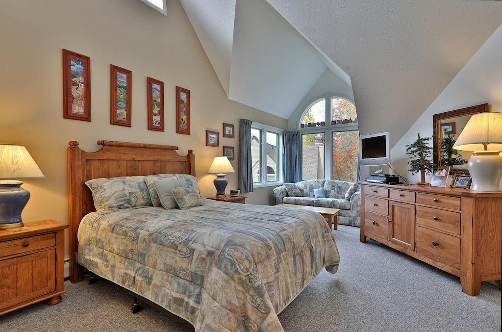 Master bedroom with vaulted ceilings