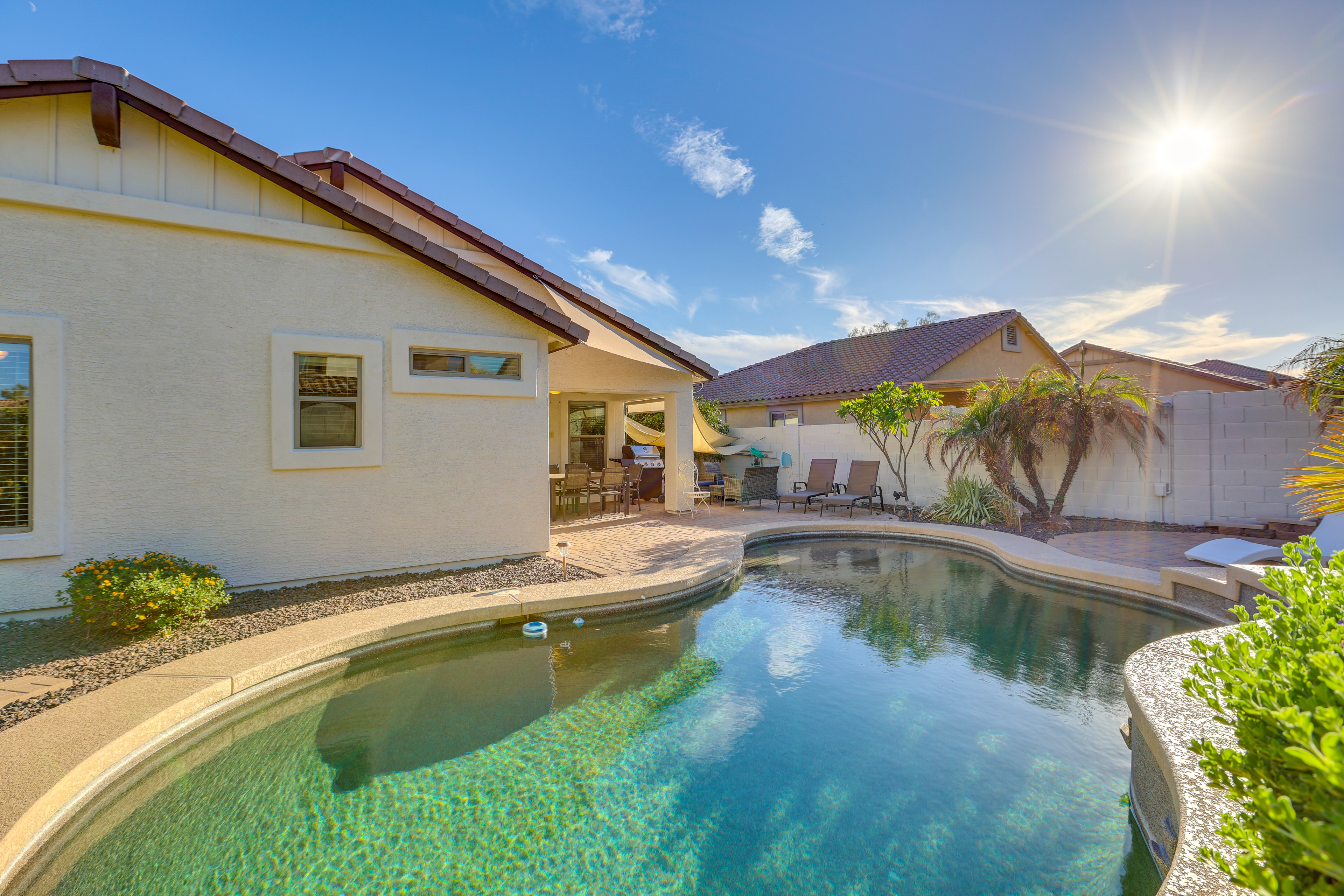 Property Image 1 - Sunny Surprise Home: Heated Outdoor Pool, Hot Tub!