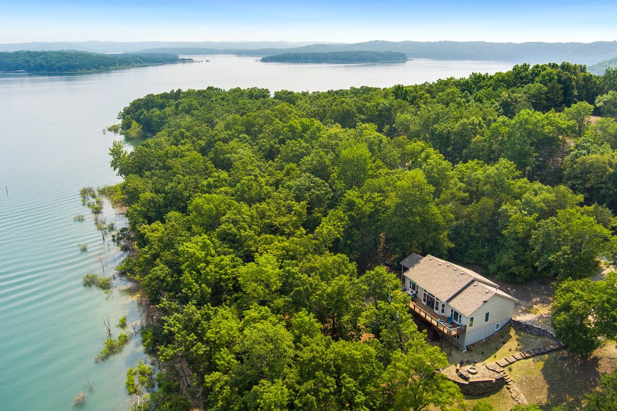 A gorgeous overhead view of our private lake home! With easy access to Beaver Lake!