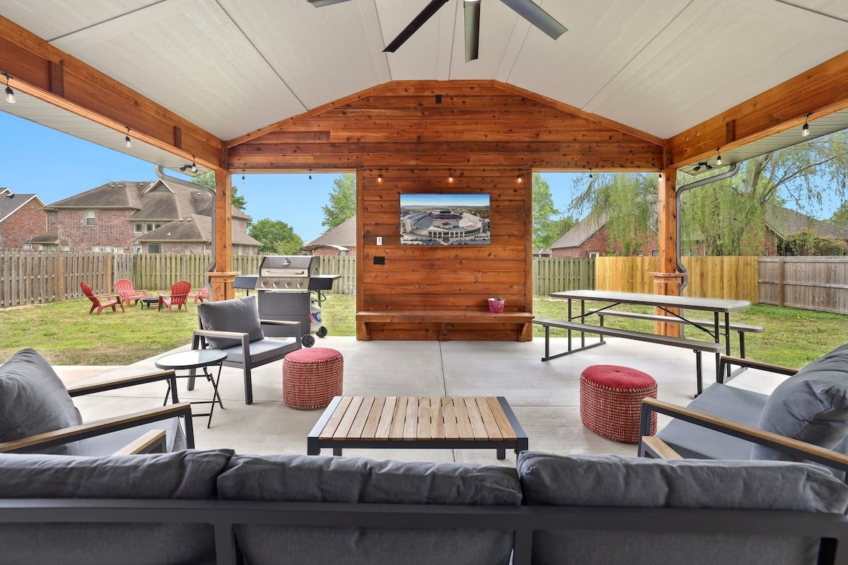 When you aren't out exploring, relax in our back yard oasis, complete with a covered patio with TV, seating, BBQ grill and fire pit.