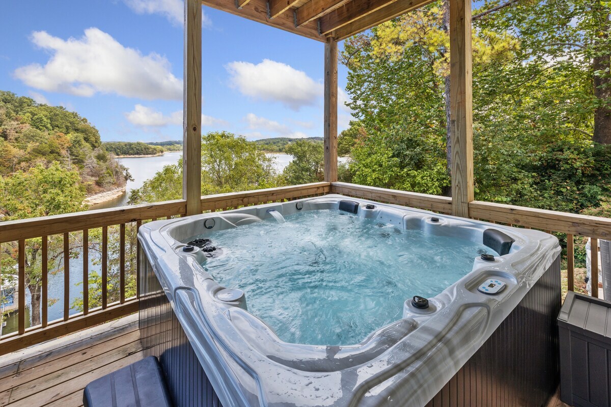 Enjoy view of the lake from our brand-new hot tub spa, located on the lower of our two full size decks.