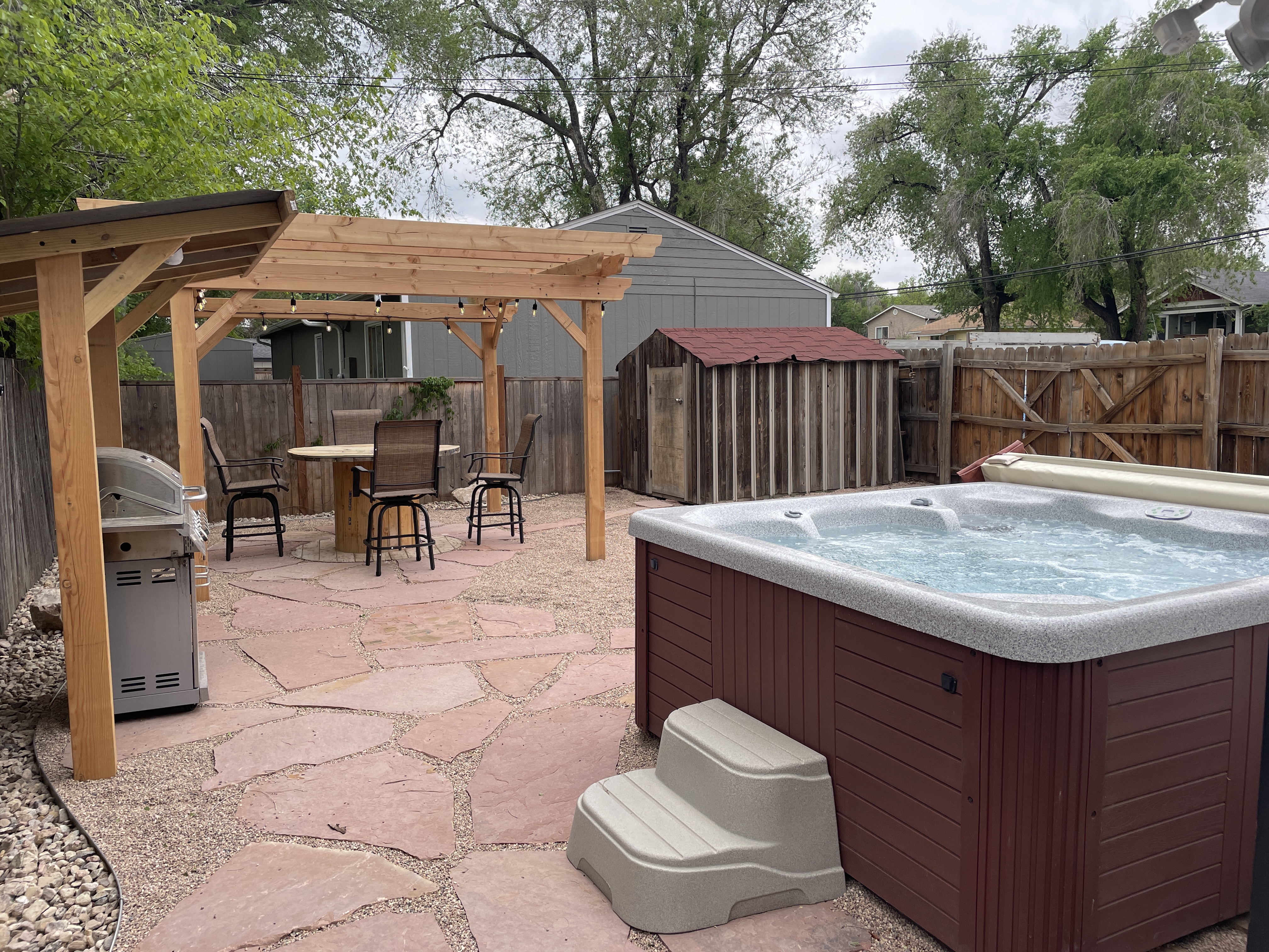 Backyard | Hot Tub, BBQ and Lounge Area