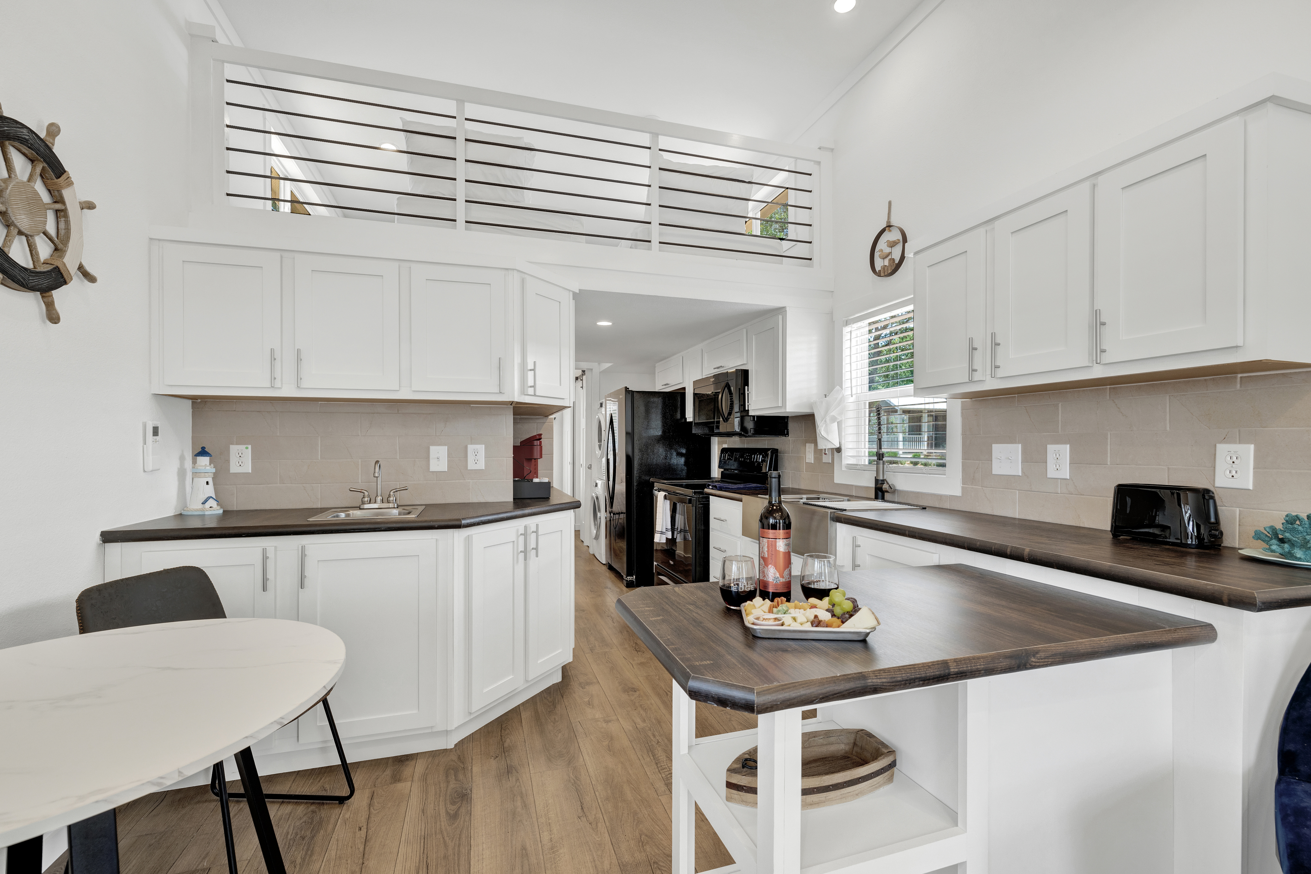 Kitchen opens to living room.