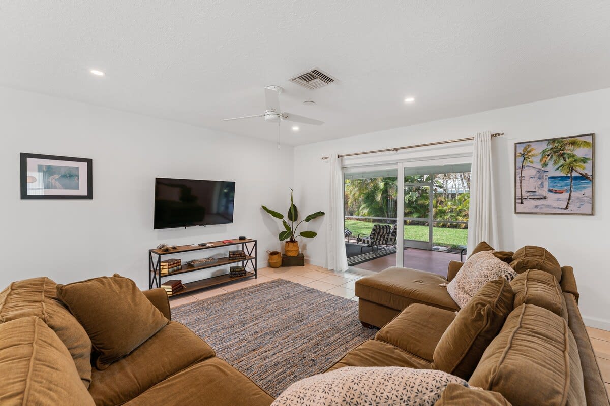 Our spacious living room with sectional sofa is perfect for evenings in after a long day at the beach.