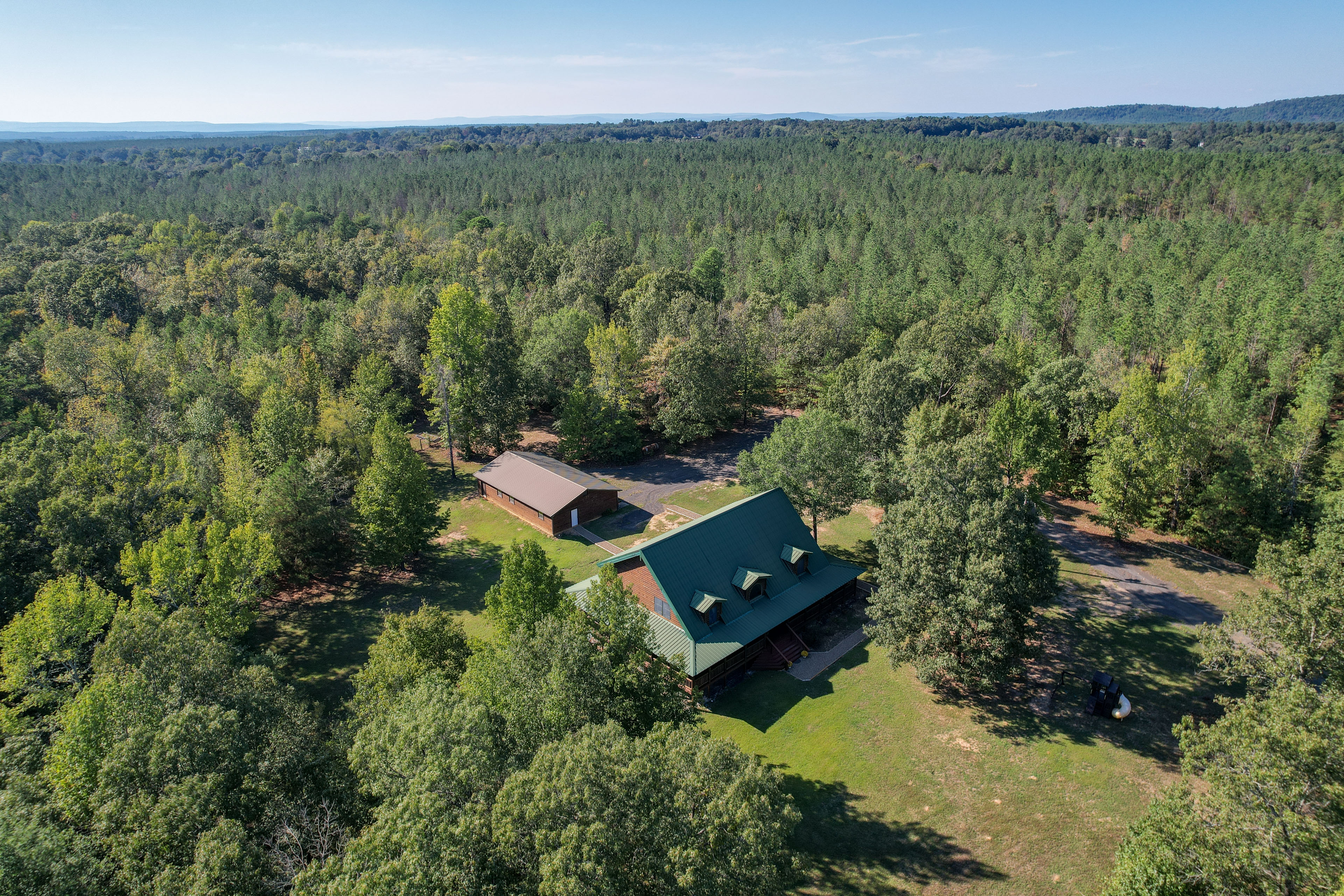 Property Image 1 - Secluded Broken Bow Cabin w/ Fire Pit and Deck!