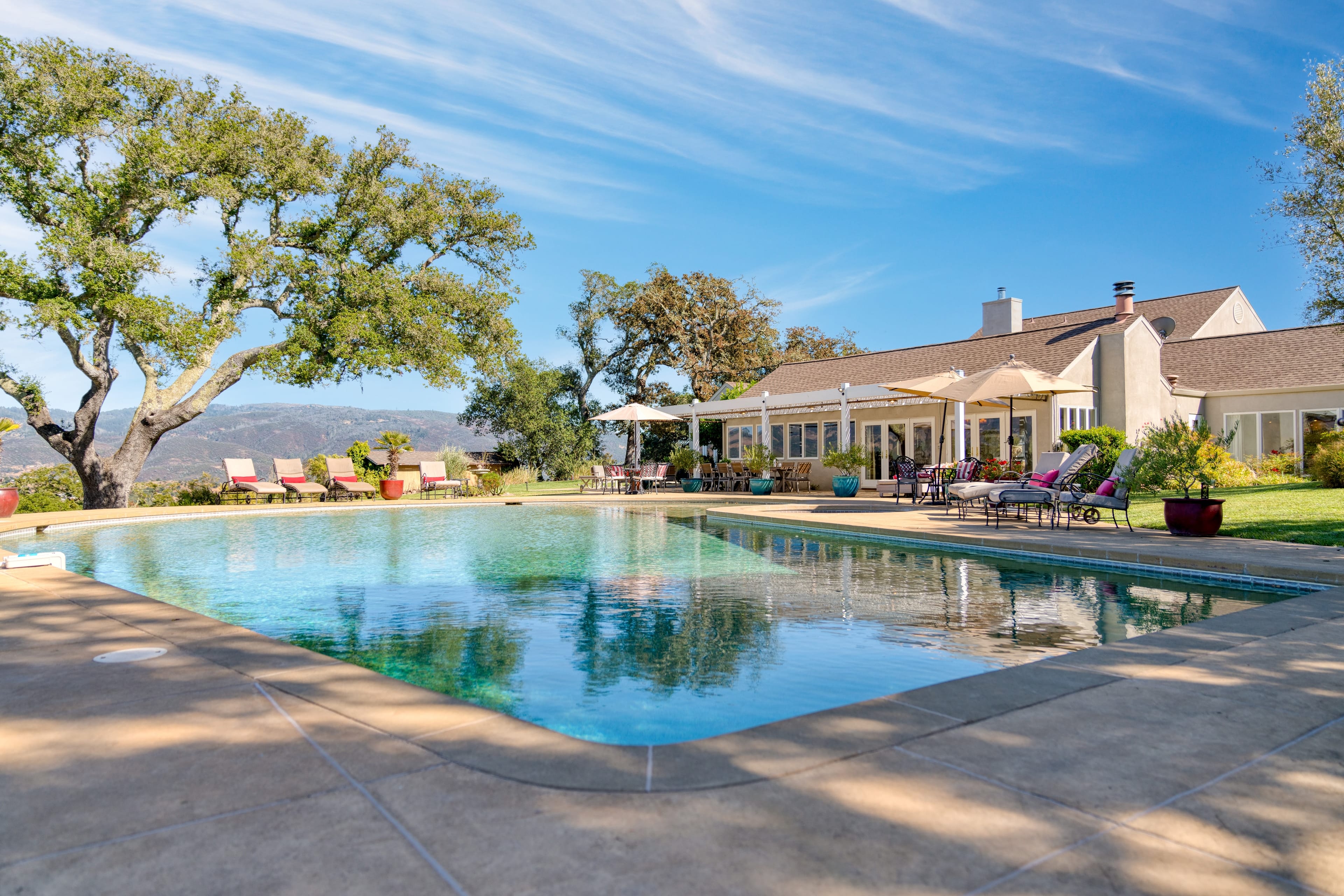 Private pool with stunning views, a hot tub, and plenty of lounge space.