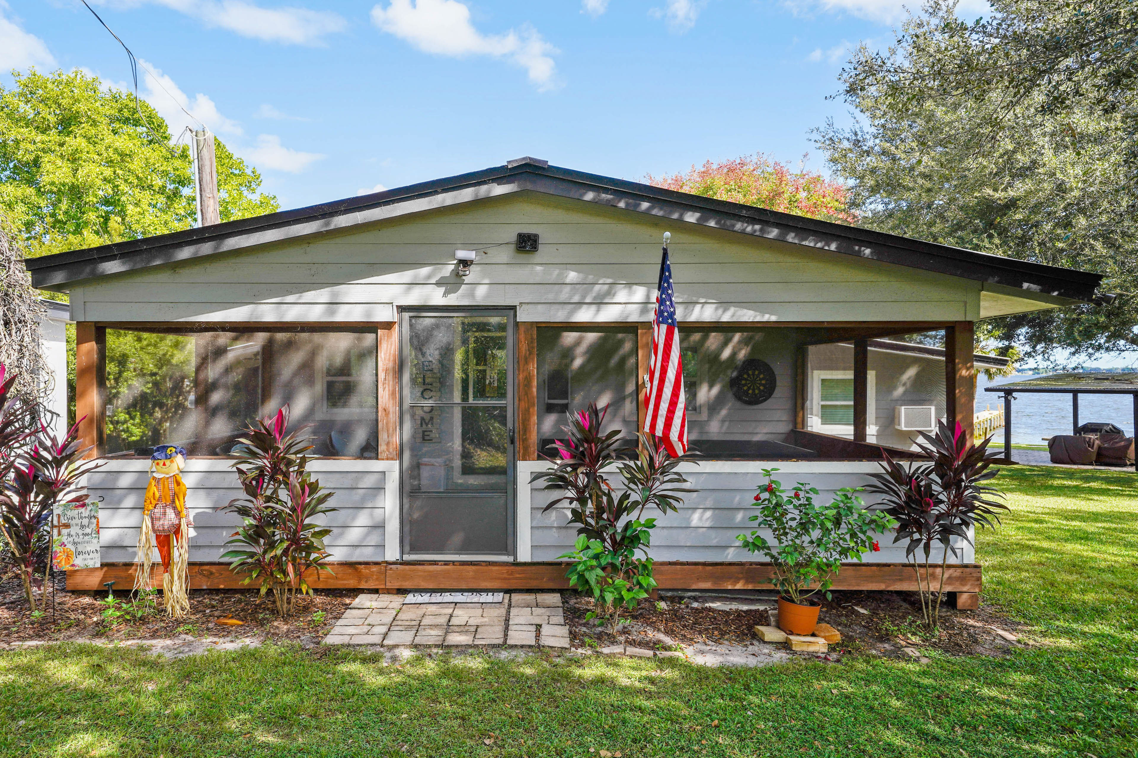 Property Image 1 - Lakefront Home w/ Screened Porches in Frostproof!