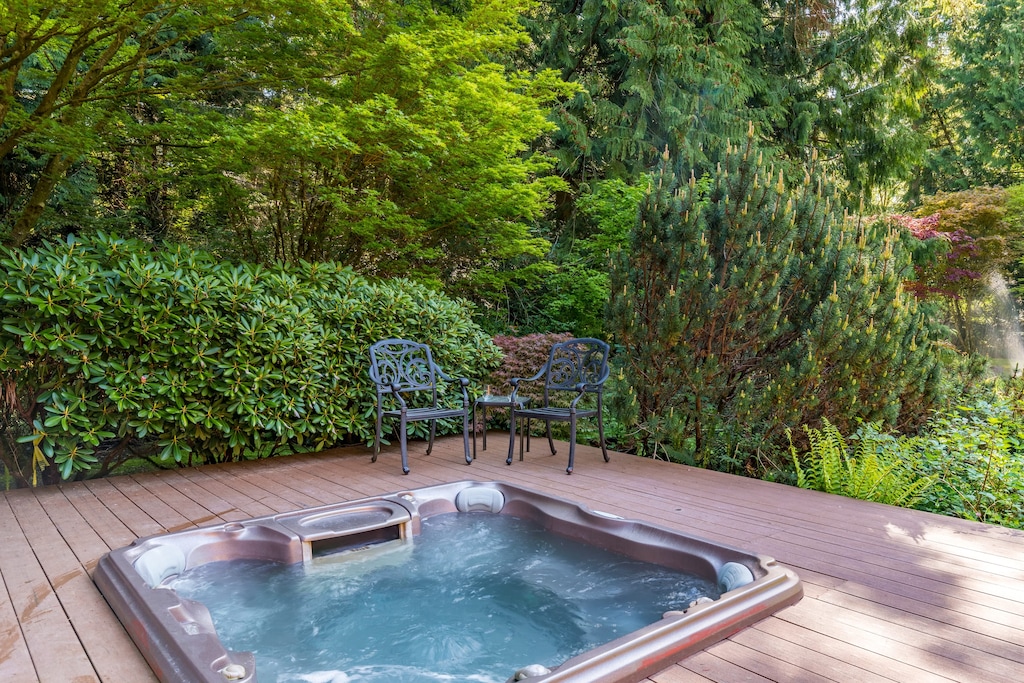 Basking in the bliss of hot tub and greenery.