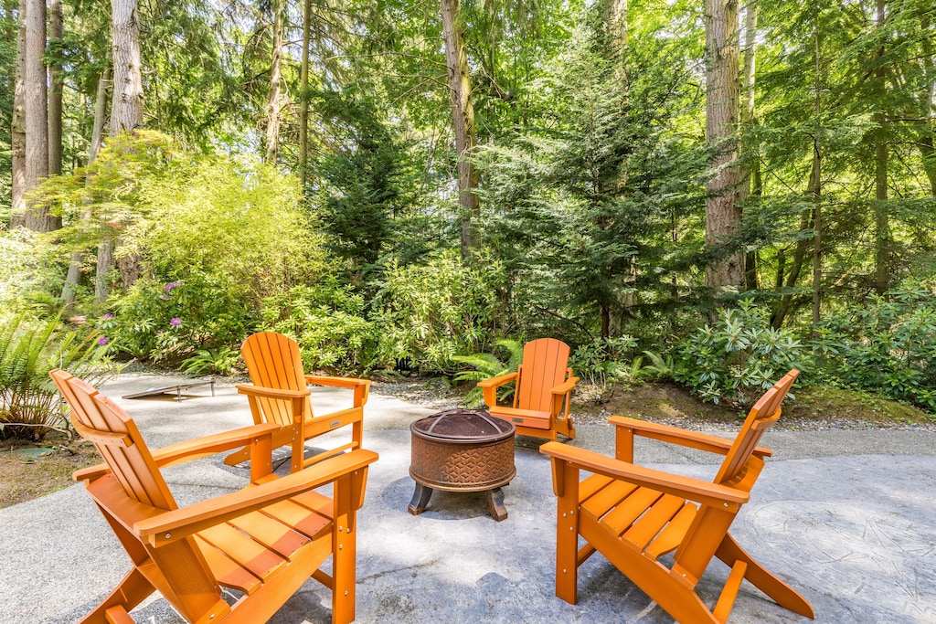 Gather the group by the firepit.