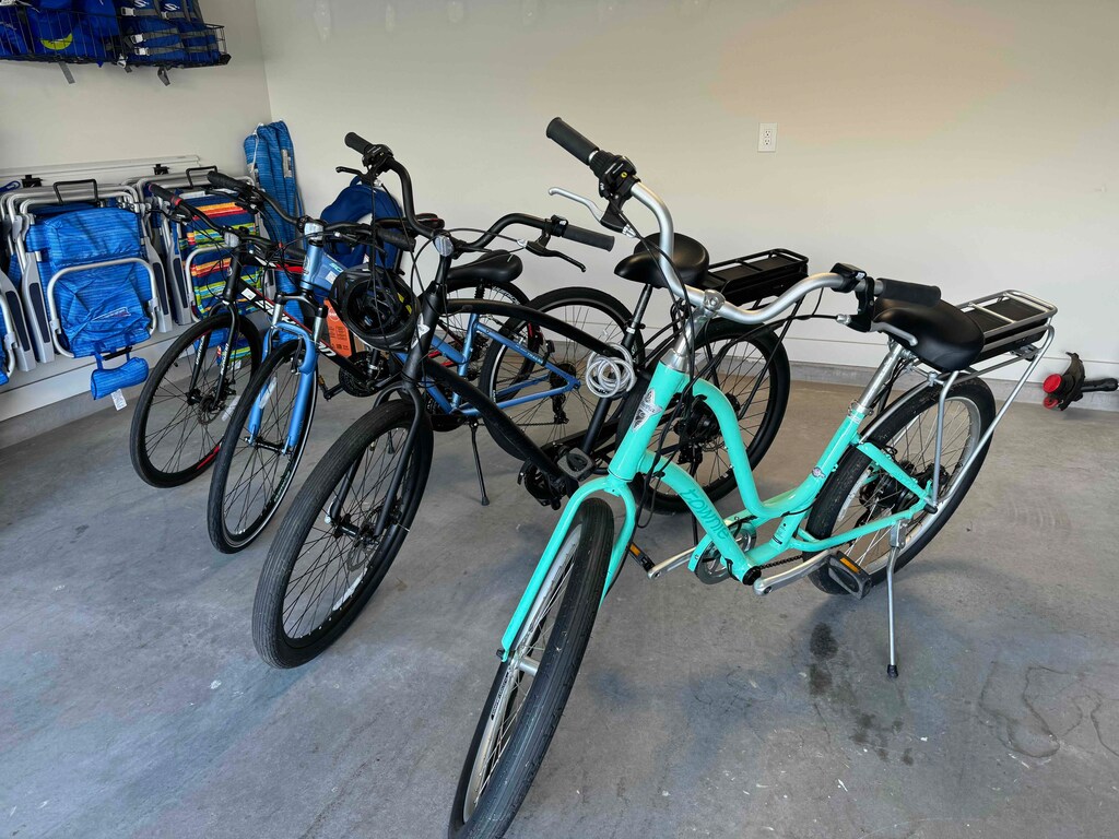 Included,  2 eBikes, 2 regular hybrid bikes,  beach gear and 2 sets of golf clubs