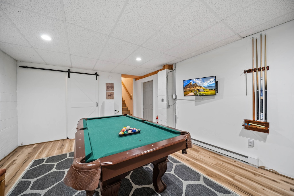 Pool Table and TV in Basement Game Room