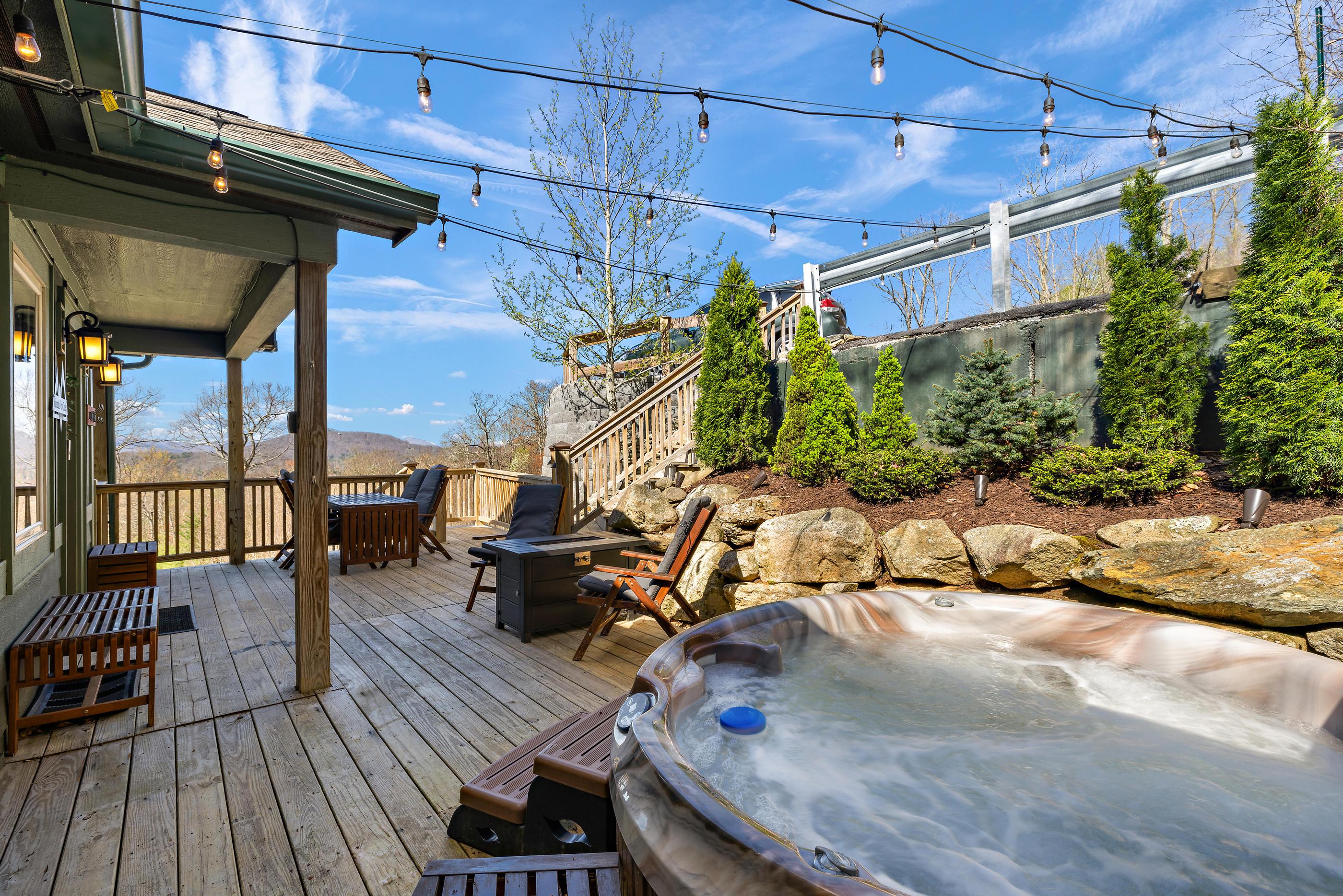 Side Deck Features Hot Tub, Outdoor Dining, and Mountain Views