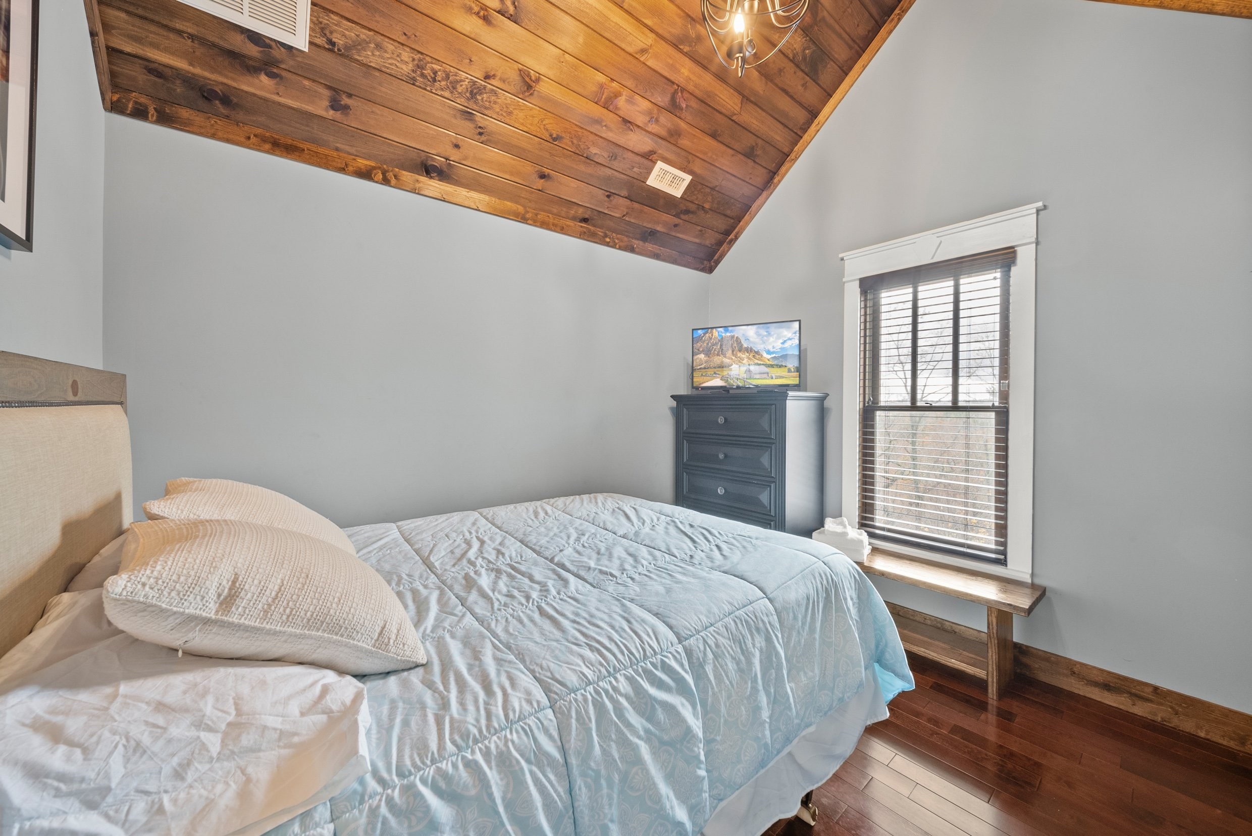 Queen Bed and TV in an Upper Level Bedroom Queen Bed and TV in an Upper Level Bedroom
