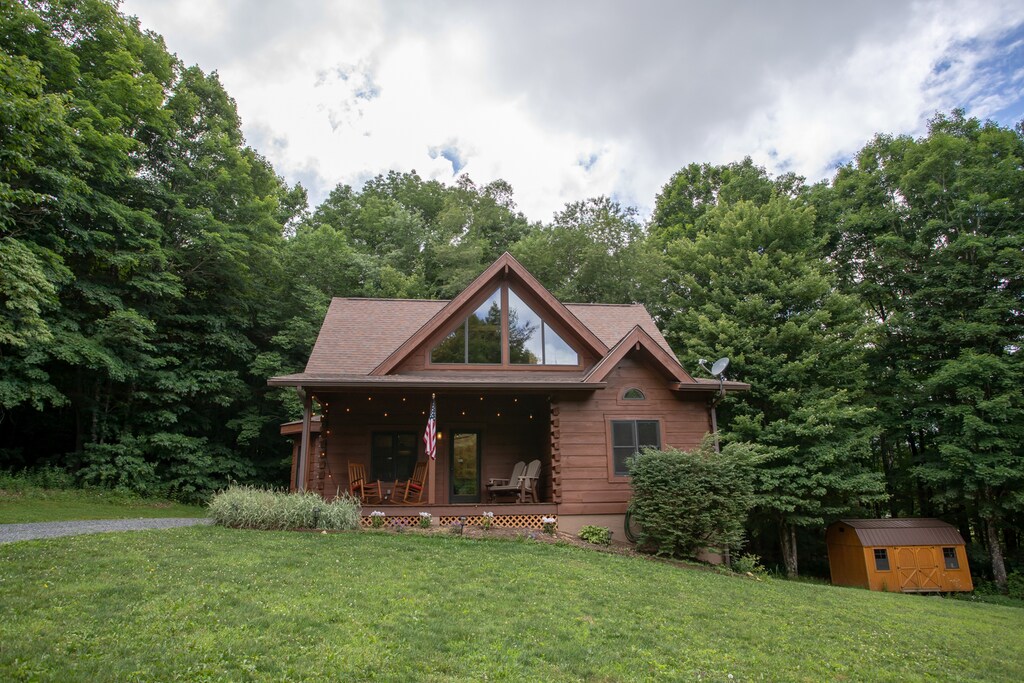 Classic Log Cabin Style with Large Grassy Yard