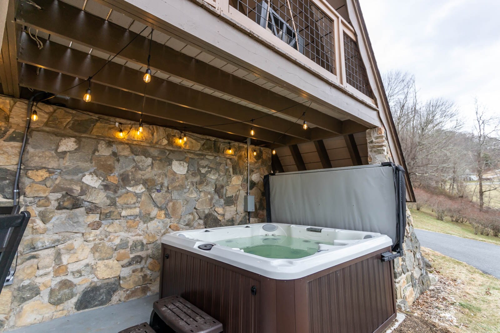 Large Hot Tub on Lower Level Courtyard outside of Den and Game Room