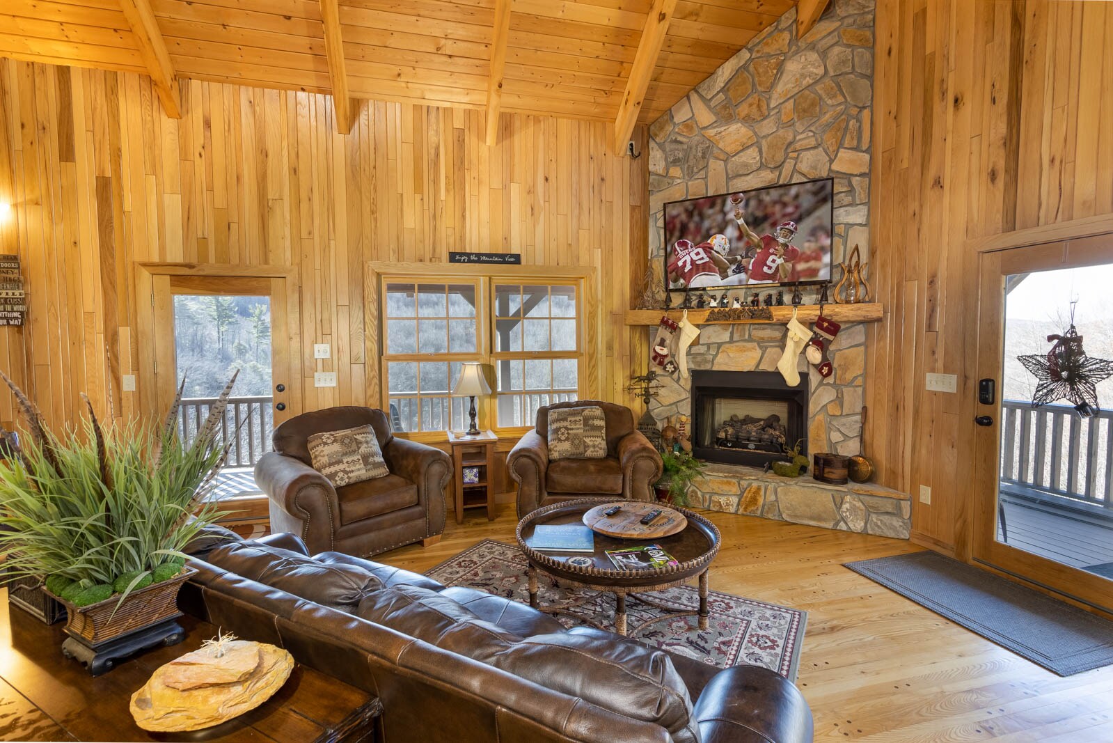 Living Room with Gas Log Fireplace and Large Screen TV