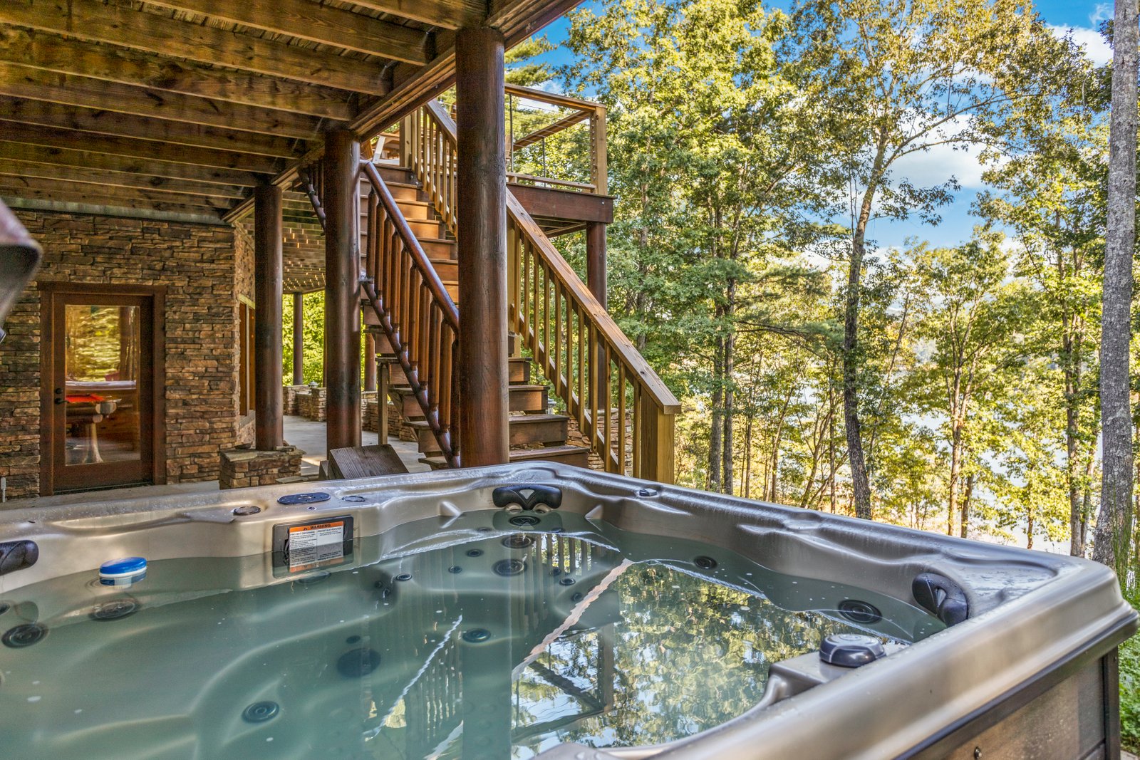 Downstairs Outside Area around Hot Tub and by Firepit