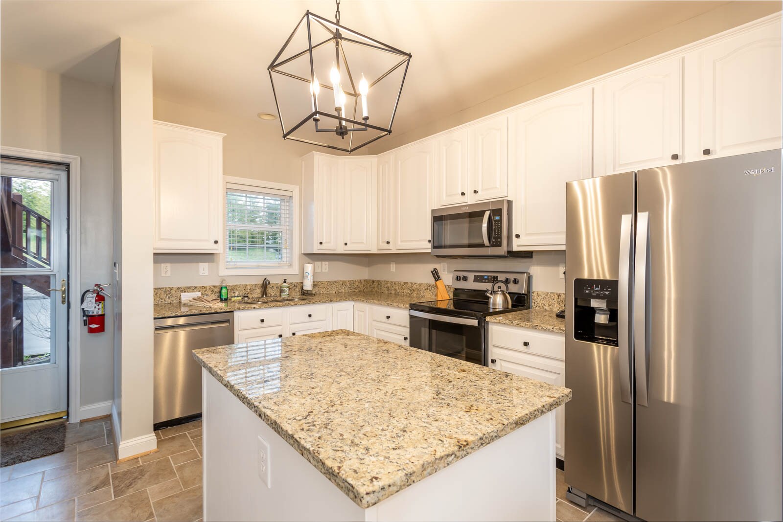 Granite Counter Tops, Kitchen Island and Stainless Appliances