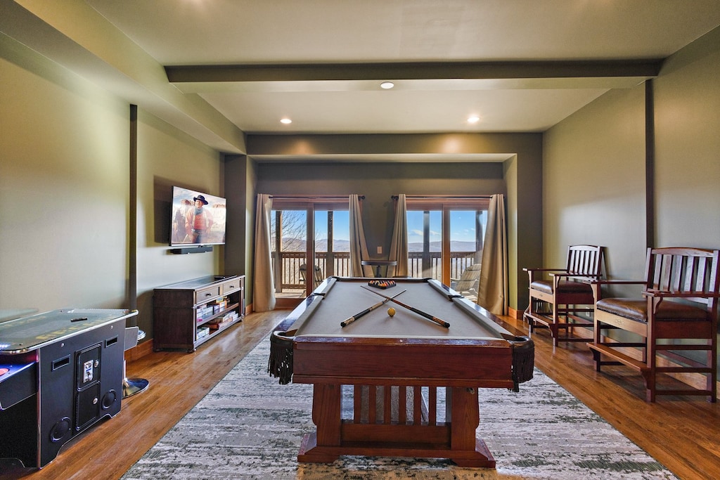 Pool Table, Seating, Arcade Game, Large Screen TV and Lower Level Deck