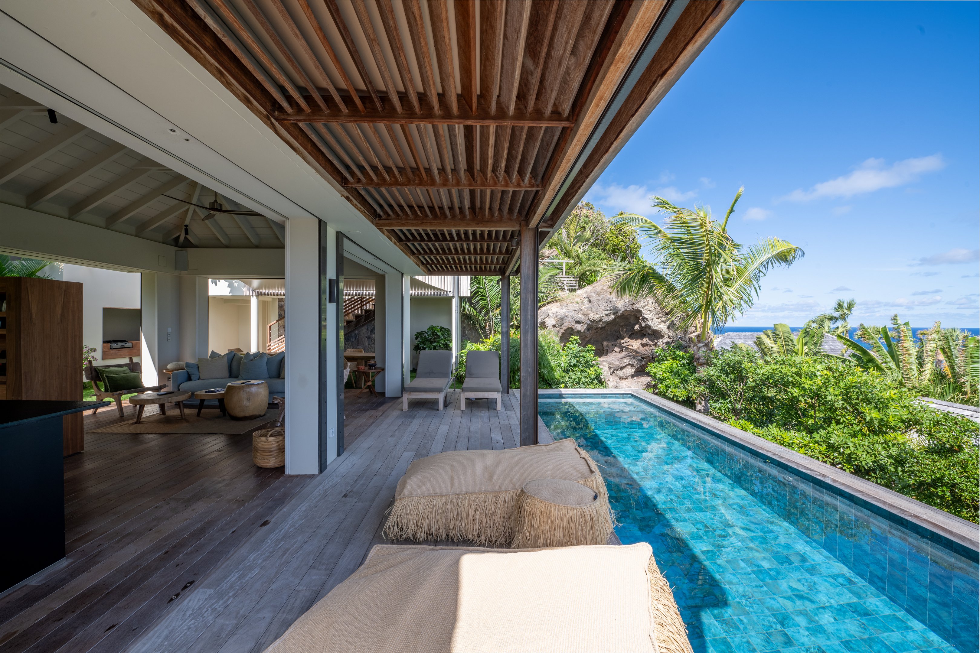 Beautiful pool facing the view. Terrace with loungers and outdoor lounge area.