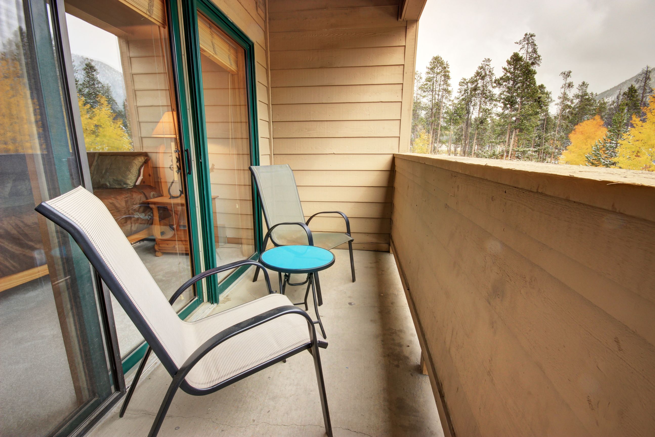 Upper level balcony with outdoor furniture