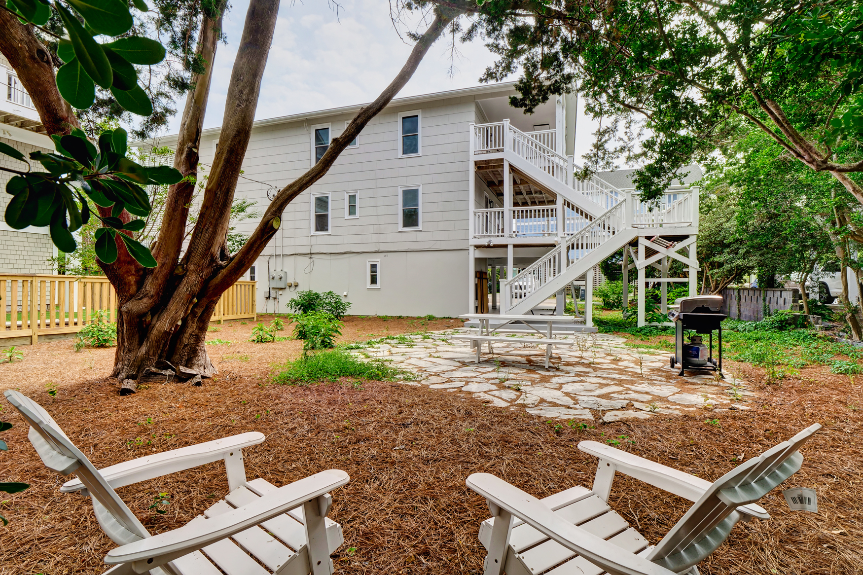 Lovely shared backyard patio for grilling out or playing games