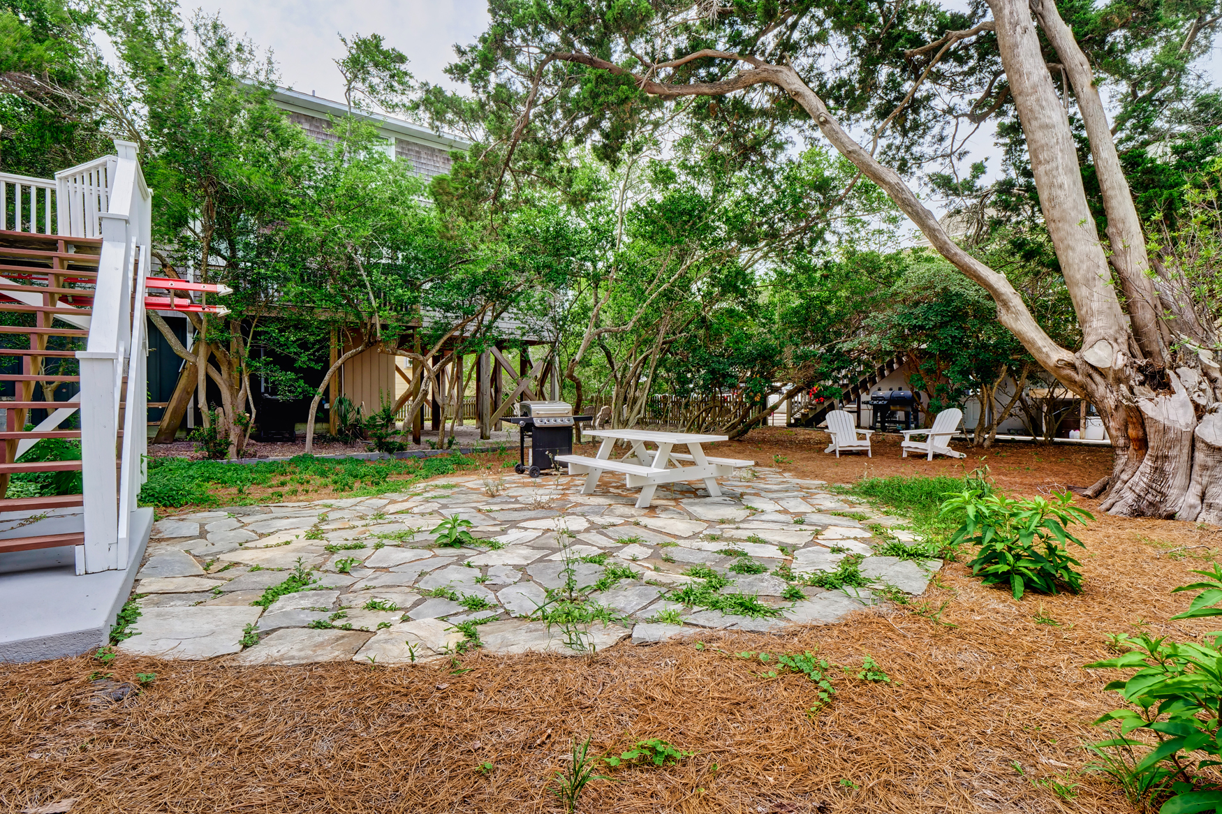 Lovely shared backyard patio for grilling out or playing games