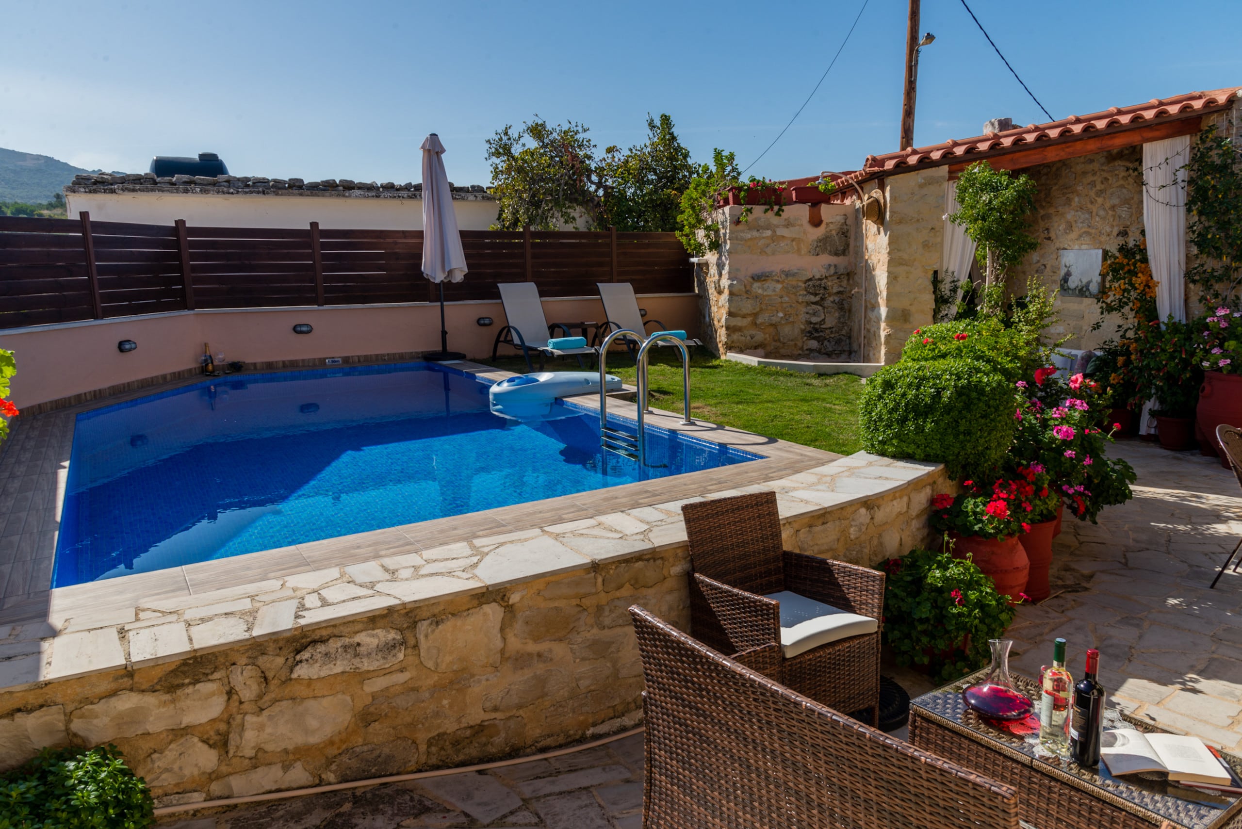 The pool and lawn covered terrace of Villa Armonia is totally private!