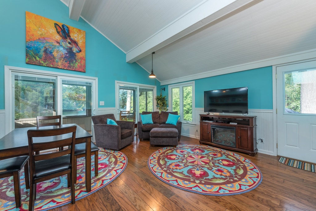 Gather in the living room to watch your favorite shows on the Smart TV (streaming and satellite available).