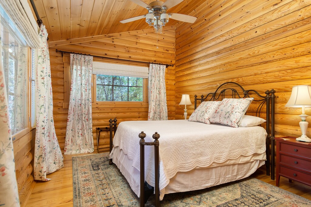 Main level bedroom with Queen bed.