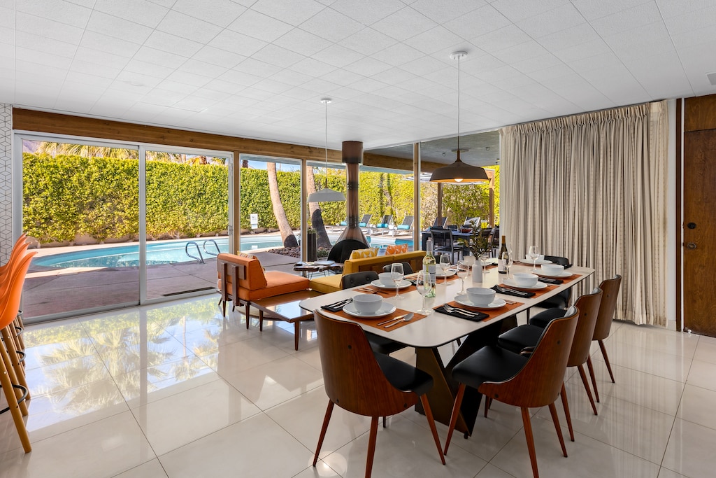 Gorgeous open concept dining and kitchen with vintage Malm-style fireplace
