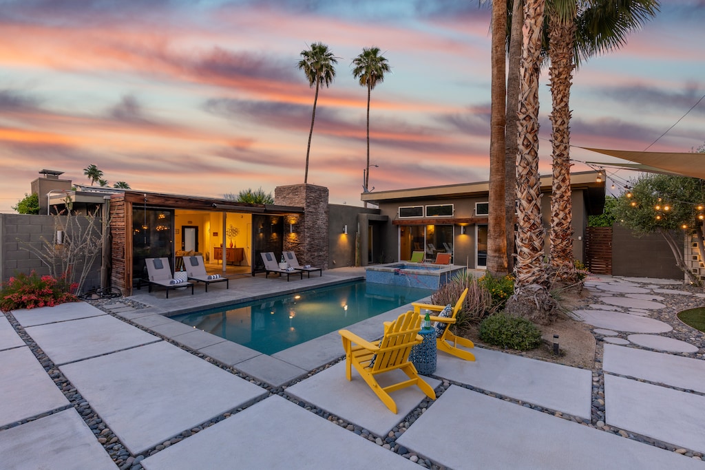 Radiant pool surrounded with multiple seating areas