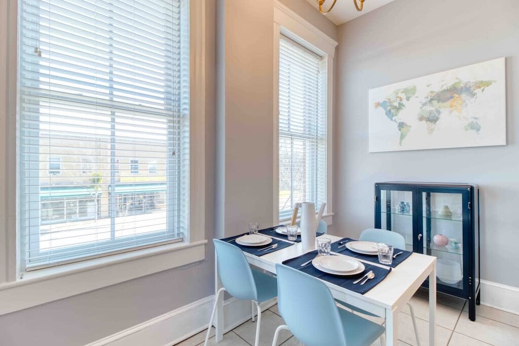 Cute kitchen is perfect for enjoying home cooked meals