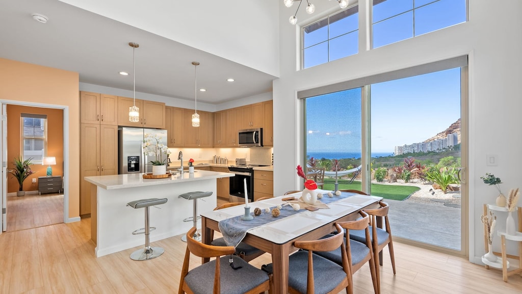 Dining area and kitchen also provide mountain and ocean views.