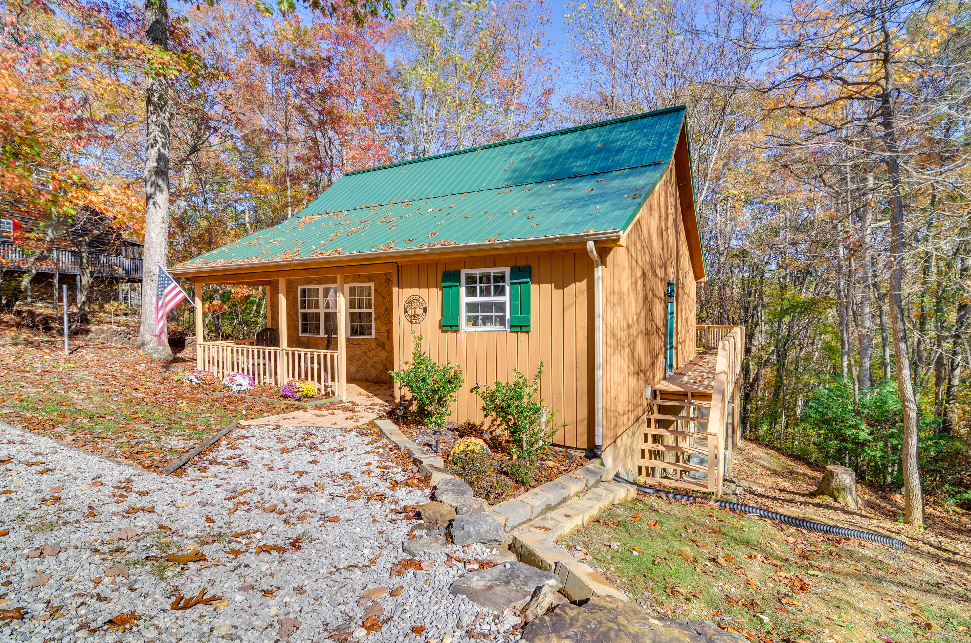 Property Image 1 - Burnside Resort Cabin w/ Hot Tub & Outdoor Spots!