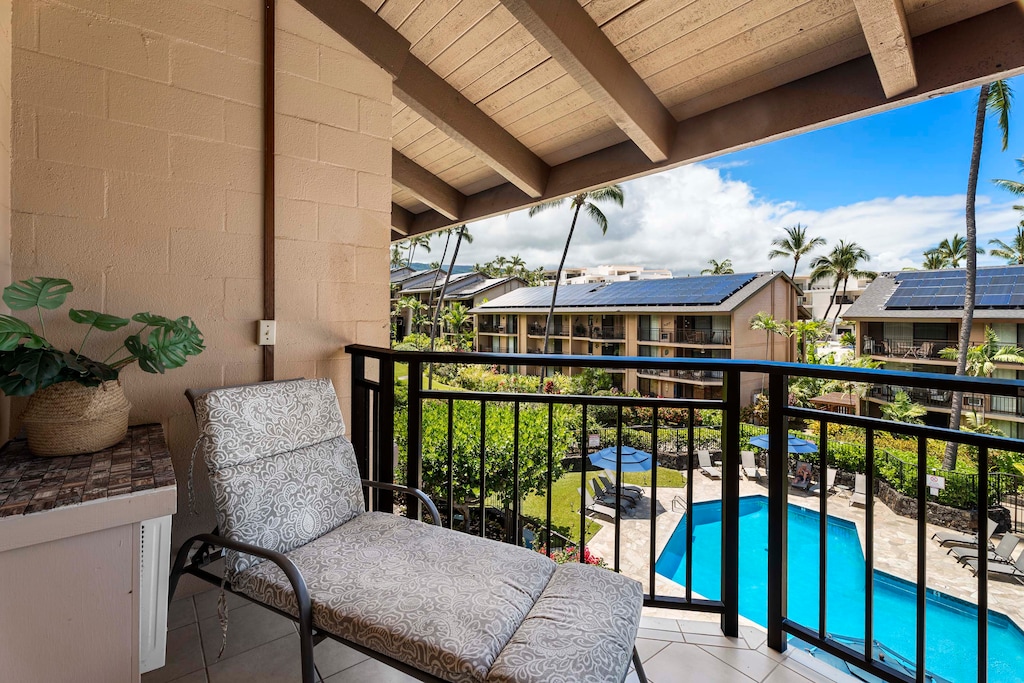 Unwind on our lanai, a peaceful retreat offering sweeping views of the shimmering pool.