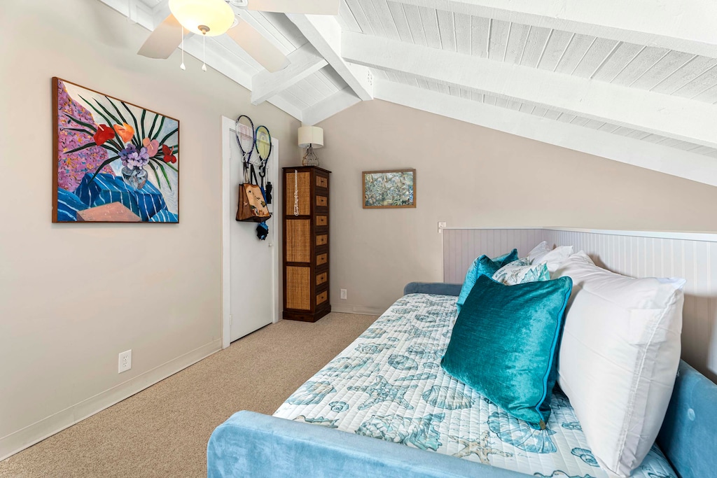 Island decor adorns the classic loft bedroom
